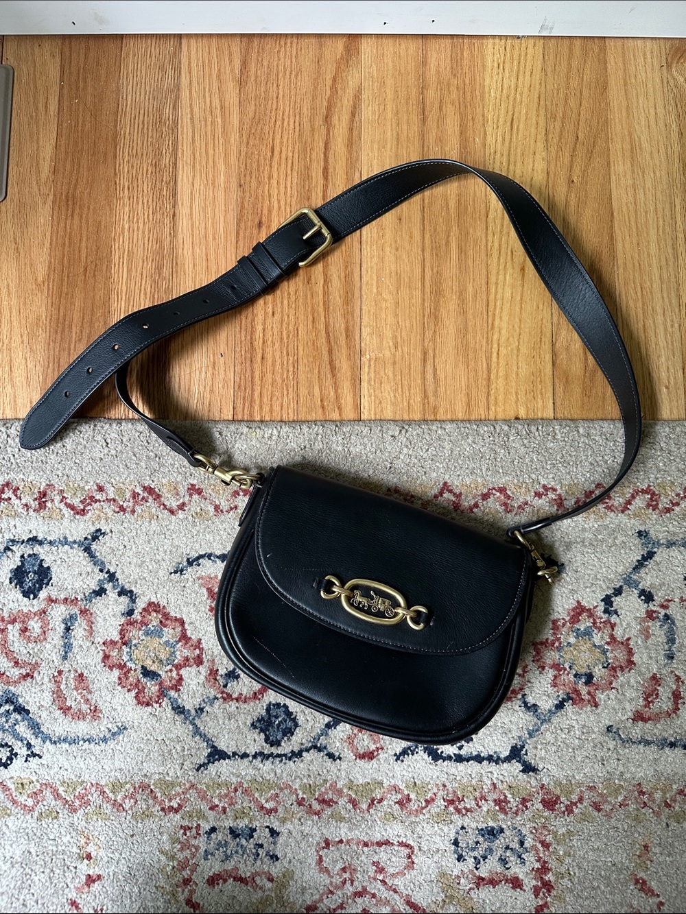 Coach Black Leather Saddle Bag with Gold Hardware